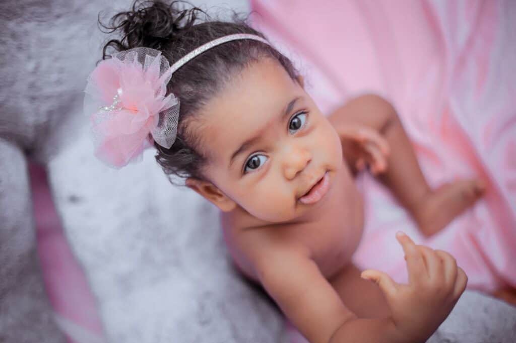 Photo of a baby girl; names that mean tiger will be perfect for your little fierce girl